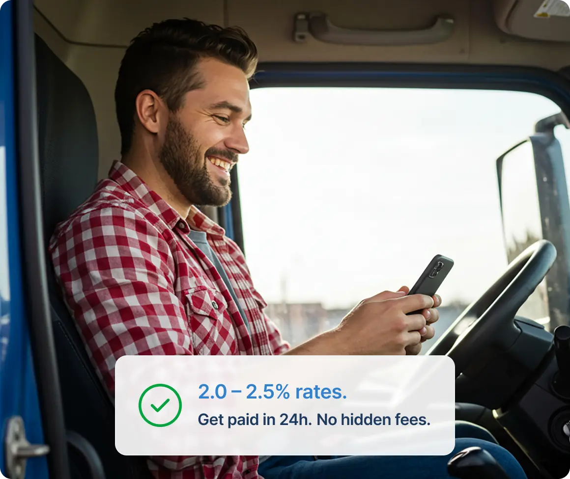 Happy truck driver using mobile app in truck cab